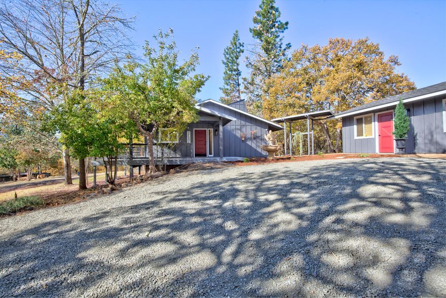 SELLER TO REVIEW ALL OFFERS 11/12 5PM. 
VIEWS! These 2 homes on 5.01 acres boast new flooring & fresh paint & so much more! The Main home has long  range views & is 1416 SF with new wrap-around deck, 3 bedrooms, loft & 1 Bath. Recently updated with new DW, range/oven & microwave, concrete counters & plumbed for a buyer's stackable washer/dryer in the closet of the central bedroom.  2nd home (ADU) is a 600 +/- SF studio, w/laundry, full kitchen, large walk-in closet & full bathroom.  ADU (Guest/rental?) has new cabinetry in kitchen & bathroom, new fixtures plus Ductless mini-split and is move-in ready! The 5.01 acre property is fully fenced and boasts 5 outbuildings plus a concrete well house.  2 larger storage units are near the homes, while the chicken ''coop''/storage area, and two others are near the field and ''goat'' pens.  Great for animals!  Raised garden boxes, fruit trees are watered by hand lines from the 10 GPM well with new pump. 2000 glln (est) holding tank is a bonus!