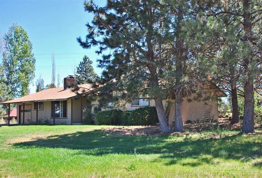 Old Bend charm awaits a new buyer. This 1540 square foot home is minutes from Bend with 3 acres of water and flood irrigated pastures. 3 bedroom 2 bathroom equipped with new flooring, a stone fireplace and a wood burning stove. Natures beauty surrounds this abode inspiring indoor and outdoor living. The canal and mountain views create a lasting serenity.