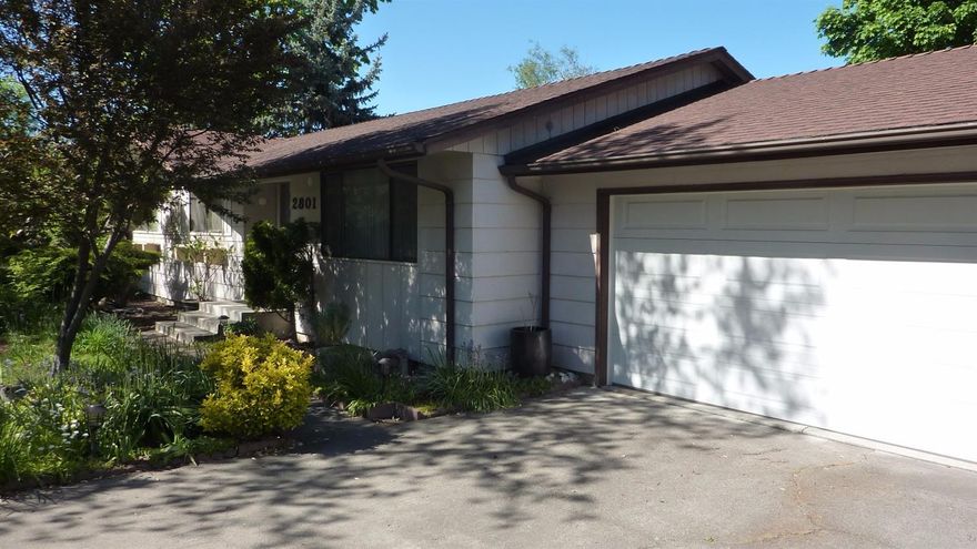 Very nice home on an exceptionally large, beautifully landscaped .26 acre lot, with Orchard Hill Elementary a hop and skip away. Great kitchen has a large pantry, stainless appliances, range oven combo with convection oven, lots of storage, which opens to a large dining area. Nice living room, 3 good sized bedrooms with a large bath nearby. Nice master bedroom with great bath and lots of closet space. A wonderful spacious, light and bright family room which would make a great art or music studio, or home school area. Best of all, is the beautiful, oversized lot. Several areas in this yard allow for entertaining, gardening, or just relaxing on the nice deck and patio. Lots of beautiful plantings and trees make for a secluded area, yet close to RVMC, Centennial Golf Course, Larson Creek Shopping Center, and lots of great areas to walk, too. If RV or toy space is needed it could easily be created in several different areas. A really nice place to call home.