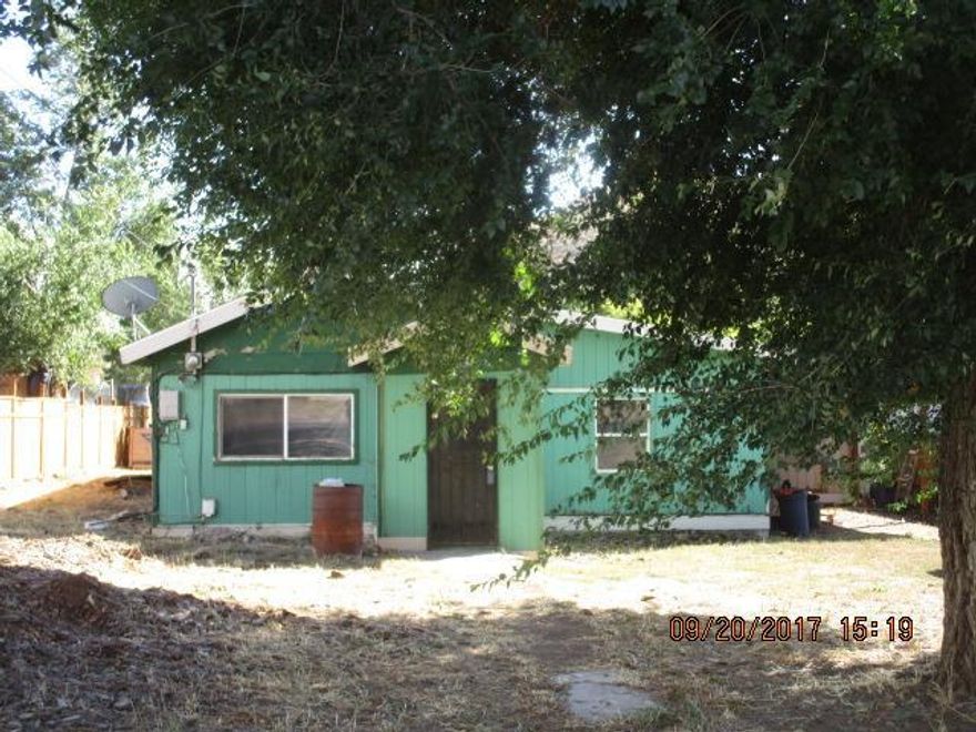 Affordable! Nice level lot with spacious 4 bedroom home. Floor plan has over 1,600 sq.ft. of comfortable living space. Needs updating but this is reflected in the price! Easy access to major roads.