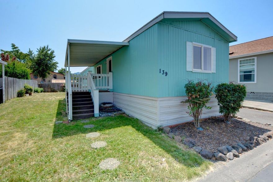 This lovely single-wide home is located in the desirable Medford Estates community. This all-ages park includes a new pool and spa, a clubhouse, playground, pet park, BBQ patio, fitness room, meeting room, pool tables, and a covered mail center. Inside, the main living area features new flooring, new interior paint, vaulted ceilings, and the split floor plan offers privacy with a bedroom on each end of the home. It's conveniently located close to schools, shopping, the hospital & restaurants. Schedule a tour today!