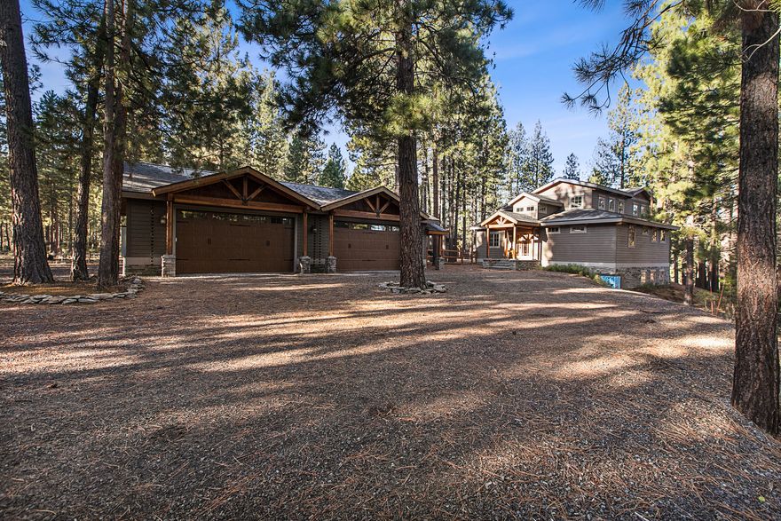 Outstanding opportunity to own a completely remodeled home on Spring River just 4 miles from the Sunriver Resort. The quality and craftsmanship greats as you enter the long driveway nestled in the tall pine trees. The home sits at the back of the 1.29 acres with 90 feet of direct river access and unobstructed views. The home is 3279 SF with a 533 partially finished basement bringing the total livable space to 3812 SF. Every room of this home has been completely updated and has a lodge feel with an extraordinary entrance, soaring wood ceilings, floor to ceiling rock fireplace, custom cabinets throughout, lodge staircase to large bonus room open to the living space. All new mechanical systems, siding, windows, and roof. Oversized 4 car garage/shop has dual zoned heating. RV hookups and hot tub. There is a large deck with river views, a deck off the primary suite and a large patio off the main floor with 3000 ft of fencing for children or pets.