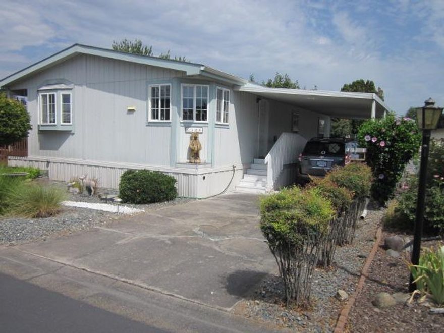 Look no more ! This 1998 Redman double wide manf. home is the one you are looking for and at this price it will not last long. Very well kept explains this 3/2bath 1344 Sq. Foot home in Bear Lake Estates. Heat pump has been replaced with a new Reem unit, Built in ramp, Most appliances are included: Refrig., Washer & Dryer, Stove/ oven, Dishwasher, Window coverings and drapes & Two storage units. Enjoy the amenities of the park such as pool, sauna, spa, pool tables, club house w/ exercise room. This 55 plus park is great for walking the dogs or biking and it is close to shopping centers. Space rent includes sewer & garbage. Buyers need to be Park Approved by the park manager.