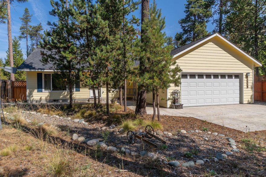 This single story home features a spacious open great room with vaulted ceilings that create an inviting atmosphere. the kitchen includes a large island perfect for meal preparations and entertaining guest a fenced backyard offers privacy, while residents enjoy access to a private community marina along the Dechutes River,ideal for various outdoor activities Situated on a half acre lot the property provides ample space for relaxation and recreation The primary suite boasts a generous walk in closet this home has been lightly lived in ensuring a well maintained and welcoming environment