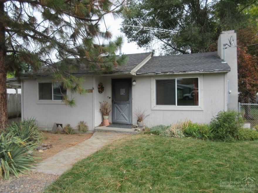 Keep it simple--live in a small house. This Homepath property is located in a nice, safe, quiet part of town. The lot is large, nicely landscaped, private, and fenced. There is a detached, single car garage, and a large carport. The house is small-easy to heat, easy to maintain, and cheap property tax. You can own this home for less per month than you would pay to rent this home.