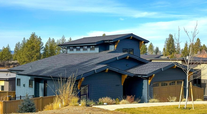 Refined, handcrafted, and nearly new with Cascade Mountain views from both levels. This Shevlin West home is adorned with gorgeous light fixtures, built-in cabinetry, Viking appliances, and premium finishes like solid core 8' doors throughout, wide plank engineered wood flooring, built-in BBQ, and an exceptional window package. In addition to the great room the main level also holds a stylish powder room, laundry room with built-ins, & polished master suite with radiant bathroom floors and curated tile & fixtures. From this elevated setting you can see the alpenglow off the Cascades and watch weather roll-in and over the mountain range. The covered side and back porch are oriented to take advantage of the warm, SW exposure. Room for everyone in the fenced backyard. Unbeatable location with Shevlin Park and numerous trails right out your back door including the new Manzanita Park across the street. The entire driveway is heated!