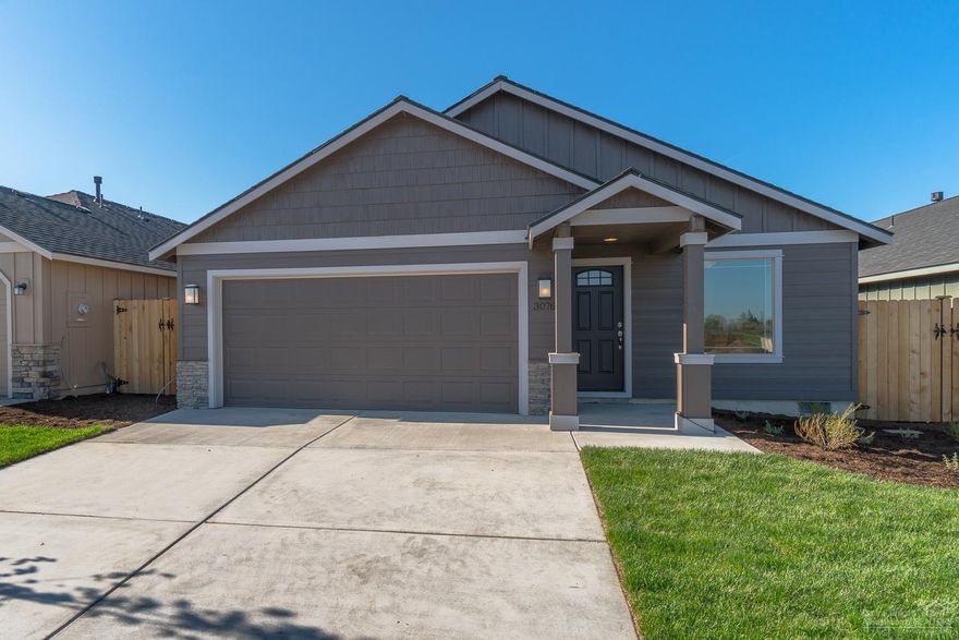 Fully completed! Brand new home in Fieldstone Crossing! 3 bedrooms, 2 baths, 1,662 sf w/tons of windows. Lg great room w/has fp, open to dining w/eating bar, Quartz slab counters in kitchen, SS Energy Star appliances, corner pantry. Spacious br's, huge Mstr closet, dbl sinks in baths. Forced air w/high eff. furnace, AC ready. Dbl garage w/covered front & back patios. Front landscaped w/sprinklers, 6'cedar fence. Model home @ 3005 NW Cedar Ave. open 12-5pm Thurs-Mon. **NEW Exterior packages and interiors package modifications. These pictures represent this Madrone Floorplan.