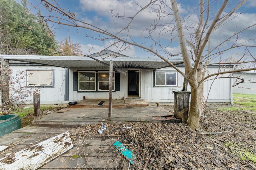 3 bedroom and 2 bathroom fixer-upper in East Medford ready for an investor, contractor or handy person to make it shine again. Open Living room, Kitchen and Dining rooms with a separate Living room to relax in. Split floor plan with Primary bedroom and bath on the opposite side of the home from the guest bathroom and 2 additional bedrooms. Large indoor laundry room and plenty of storage. 2 car detached garage with plenty of room for RV parking. Located on a cul-de-sac and close to shopping, medical facilities and parks.