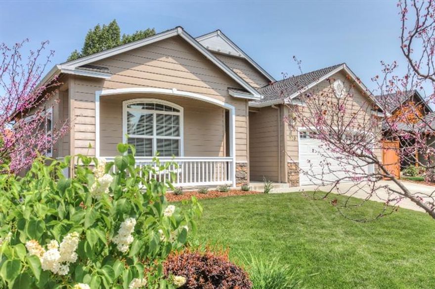 You are immediately welcomed to the charm of this 2008 built home in Southwest Medford. This one story home includes 2 bedrooms, 2 baths in 1280 square feet & is highlighted with the many upgrades throughout. The great room of the home is light filled with a gas fireplace, brushed bronze light fixtures, carpet & ceramic tile flooring with an open concept to the dining area & kitchen. In the kitchen, a center island offers additional seating & is surrounded by white cabinetry & a subway and mosaic tile backsplash as well as French doors leading to the custom designed back yard. Two ponds, a hot tub & brick pavers give this private back yard a wonderful place to relax. The master bedroom features vaulted ceilings, a large walk in closet, a door leading to the back patio & a master bathroom with a large soaking tub with a chandelier above. You won't want to miss this wonderful light filled home in a desirable neighborhood close to all the Rogue Valley has to offer.