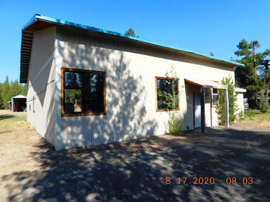 Perfect RV Set-up or Build Your Future Dream Home!! This 1.27 acre, fully fenced lot has 2 wells, septic installed in 1996, 2080 SF permitted shop & an apartment. Apartment was part of the original cabin that was built sometime in the 1950's (per Deschutes County notes in DIAL), then the shop was built over most of the cabin in 2006. Seller removed the cabin that was inside the shop & kept the end for a great little apartment that now has a kitchen, bath, bedrm & lots of storage. Also has a 40' long Covered RV Storage Building. Room to build or use it as a great RV spot with 2 RV Hook ups for family reunions or a quite vacation spot. Nice fire pit area in back for those cool evenings. Grass surrounds the shop, new gravel set in floor of Shop. Exterior of shop was just painted. Owner to leave riding lawn mower, snow blower and everything in the apartment at no stated value. This is all tucked into a great little neighborhood close to everything Central Oregon has to Offer.