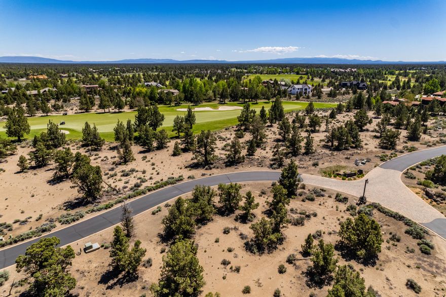 Embrace the Easterly views of the Powell Butte Mountains from this expansive & level 1/2+ acre homesite. Overlooking the #2 Fairway of the Nicklaus Golf Course, this lot is nestled w/in the Estates of Pronghorn, a private community offering the serene beauty & tranquility of Central Oregon. As a resident, you'll have access to unparalleled amenities at Juniper Preserve. Enjoy 36 holes of Championship Golf on the Fazio & Nicklaus courses & a private members club provides exclusive dining experiences, an on-site market & a luxurious day spa. Leisure is at your fingertips w/ pools, hot tubs, a state-of-the-art fitness center, & a wellness center. The community also offers a staffed 24-hour gate, pickle-ball courts, dog park, scenic trails, & access to public lands for endless outdoor activities. Including a full Pronghorn Premier Club Membership Deposit valued at $115,000 granting you full access to all the amenities this prestigious community has to offer.