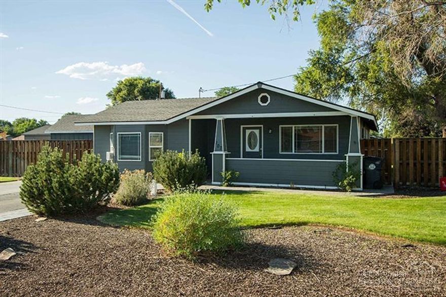 Single level home on 0.24 acre corner lot in north central Redmond. Fully fenced and landscaped. Home sits well back, affording deep front yard. Covered front porch. Convenient galley kitchen with sliding door to deck from dining area. RV parking area, graveled play area, storage shed. Close to Redmond's revitalized downtown and Civic Center area and only a few blocks from St. Charles hospital and surrounding health care services.