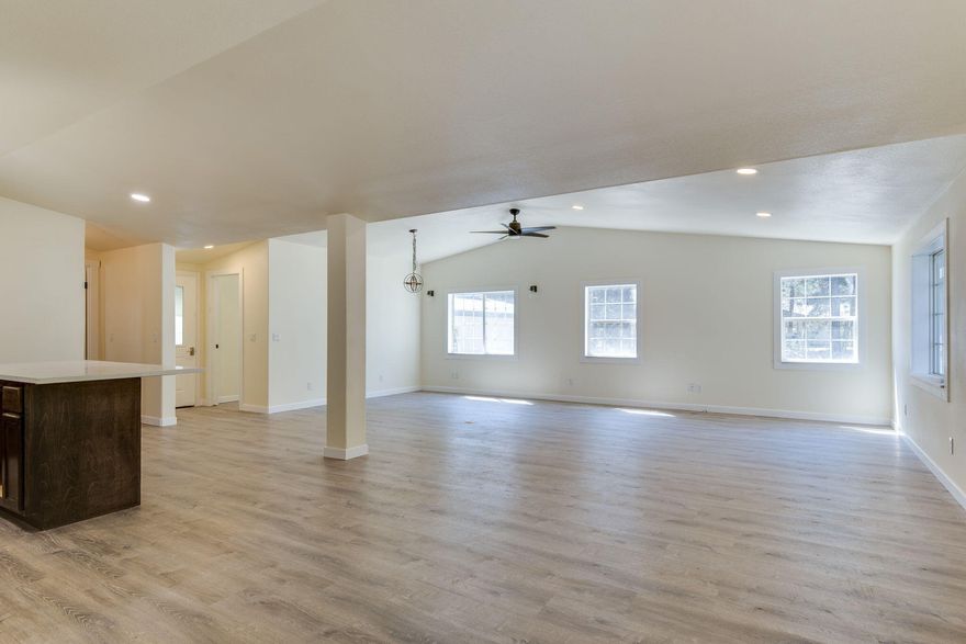 Nestled in the quiet subdivision of Tall Pines on a nicely groomed 1.03 acre lot. This home offers privacy & plenty of outdoor space. New paint, counters, cabinets, flooring, bathrooms, and more. Interior has been entirely redone. This 2 bed, 2 bath home is perfect for your vacation getaway or your full time residence! Great room plan w/ vaulted ceilings and laminate flooring throughout. Kitchen features quartz counters, full heigh backsplash, & central island. Outside property boasts 28'x40' shop w/ two 10' additions off the back and a 12'x50' storage lean to off to the side. Plenty of room for outside RV parking as well. Property is minutes to world class fishing, lakes, and the Deschutes River. Town is minutes away as well as local campgrounds. Enjoy all that Central Oregon recreation has to offer from your own parcel of privacy!