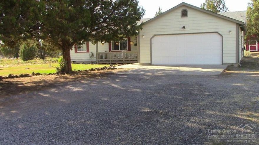 Sit on the back deck and enjoy your coffee while watching the deer in this quiet peaceful setting! This home is move in ready 3 bedroom, 2 bath with an open warm and comfortable floor plan. Attached double garage is extra large and has a nice work area with a work bench. There is plenty of room for you to park your RV. Crooked River Ranch has all sorts of amenities to offer such as golfing, tennis, disc golf, pickle ball, a saltwater pool, miles of trails and the best fishing around!