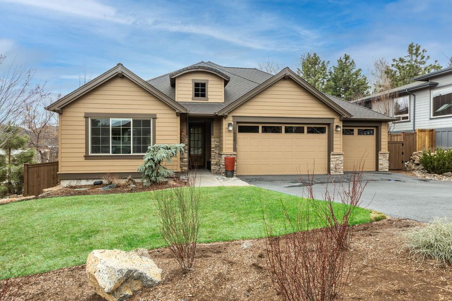 This single level home has all the right features. Spacious primary suite has an oversized walk in closet and gorgeous soaking tub. Second bedroom has its own bath. The third bedroom doubles as a great den/office. High end features, like nine foot ceilings, hand texture walls, custom built in cabinetry, engineered wood flooring and art quality glass chandelier in entry, great room, kitchen/dining room, quartz countertops with full height tile backsplash in kitchen, and extra windows throughout let all the light in. The 3 car garage has room for all the Bend toys. Fully landscaped and fenced back yard is ideal for pets and families with a spacious covered patio for entertaining. Situated in a neighborhood convenient to shopping, schools and the river trail.