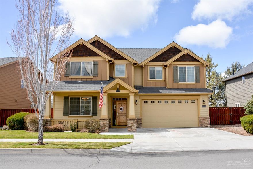 Beautiful home in desirable Fieldstone Crossing! Large 4 bedroom layout with features that include: big bonus room, hardwood floors, tile counters, master bath w/soaking tub, butler pantry, formal dining/office area, A/C, rock fireplace, stainless steel appliances & 3-car garage. Community has a pool, common area, play structure & walking trails.