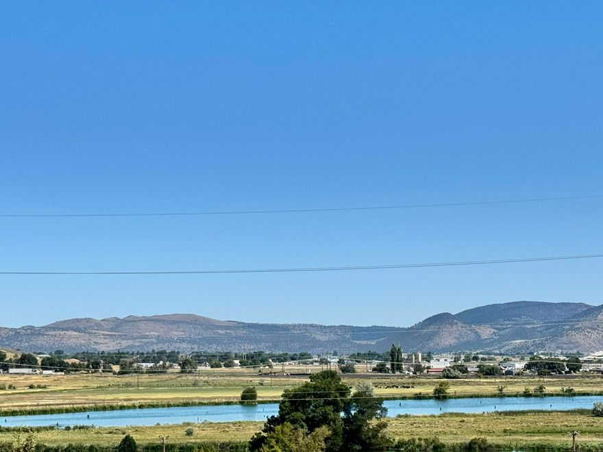 Three lots totaling 2.89 acres offer a rare opportunity to build your dream home with stunning views of Lake Ewauna, the Klamath River, and surrounding mountains. Enjoy the beauty of the Klamath Basin with city water, sewer, and power available at the road.