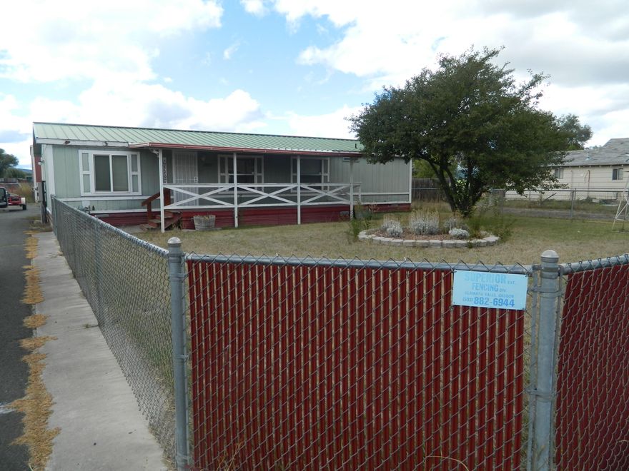 SHOP SHOP SHOP!!! This 3 bedroom 2 bath home with 1404 sq ft sits on .48 acres. There is a 30x50 shop with a large rollup door that can fit large vehicles in it. The home is well cared for and has a split floor plan. The kitchen has a pantry and eating bar. The shop has an office with a bathroom in it and is heated. There is also a gas hookup for the shop