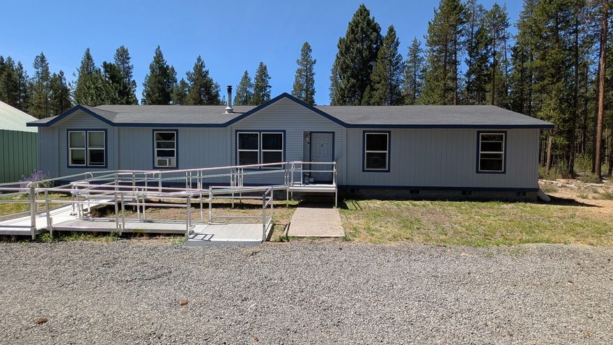 Great location!!! 4 bedroom, 2 bath home on a 2.84 acre lot close to National Forest. 1000 sf shop/garage. Beautifully updated primary suite bathroom. Kitchen update will be completed before close.