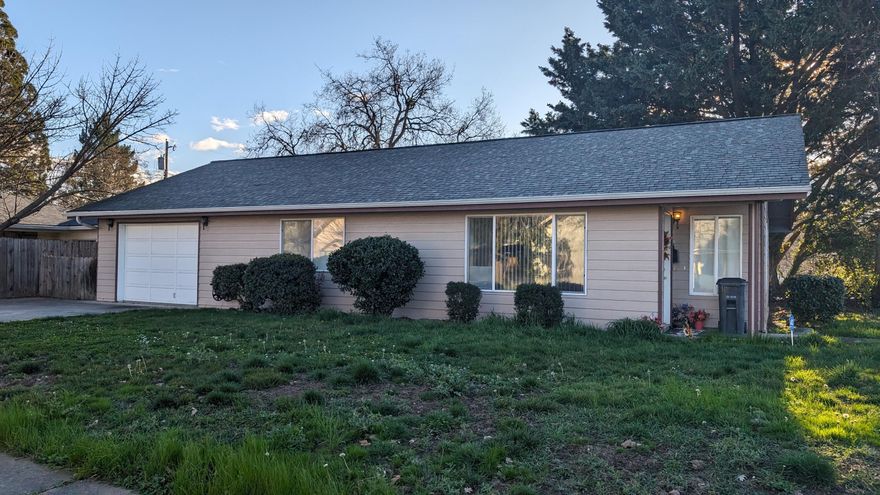 This Central Point home has a wonderful location.   Two large bedrooms/ one huge bathroom with 1181 sq. ft of living space.  There is a huge kitchen with abundant cabinets and counter space.  A dining area is located off of the large living room.  Extra large single car garage with storage rooms at the back of the garage.   There is even RV parking.