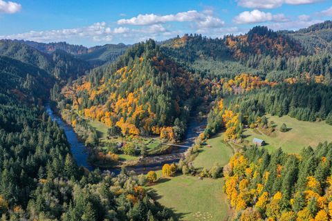 Tiny photo for 27277 Lower Smith River Road, Reedsport, OR 97467 (MLS # 220211864)