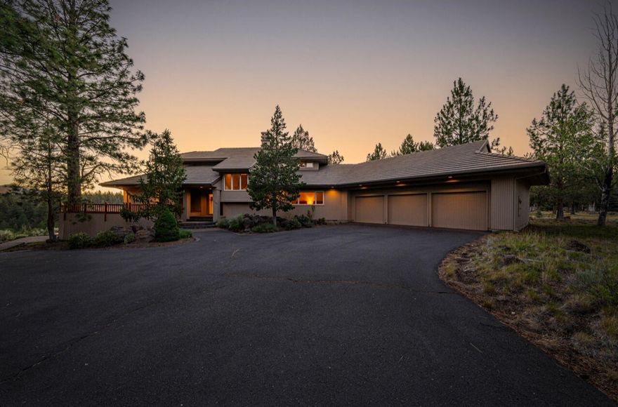 Perched above Whychus Creek in the prestigious Rim at Aspen Lakes, this custom-built retreat offers an extraordinary blend of privacy, serenity, and sweeping
Cascade views. Gently lived in as a second home, the home reflects quality construction, extensive built-ins, and intentional design in every detail. Inside, a
sunken living room creates a warm and inviting focal point on the main level, where two junior suites provide comfort and privacy. Upstairs, the vaulted primary
suite is a sanctuary of its own, with walls of windows that frame breathtaking views in every direction. Step onto the expansive wraparound deck and take in the
sounds of the creek below, with Deschutes National Forest unfolding just beyond—nature truly surrounds you. A spacious 3-car garage offers ample storage for
your Central Oregon lifestyle, and the low-maintenance 2-acre lot allows you to spend more time enjoying it all. A rare opportunity to experience refined
mountain living at its best.