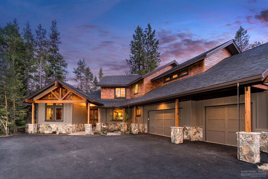 COBA Tour of Homes winner for best value! Brand new quality built home on the Woodlands golf course. High end finishes including a gourmet kitchen with chiseled edge granite counters, stainless appliances, copper sink and gas cooktop. 3 car garage, wood windows and doors, natural interior and exterior stone, heated tile floor in master bath, 3 gas fireplaces, hardwood floors, central vac, master on the main level, golf course views and much more.