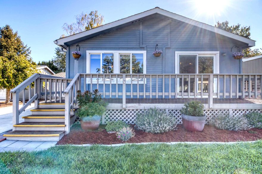 Discover Snowberry Village, a welcoming 55+ community in NE Bend close to shopping, parks, and medical services. This home features vaulted ceilings and open living room with an abundance of natural light. Recent improvements include newer carpet, heat pump, gas fireplace, interior paint, updated thermostats, and Leafguard filters. The kitchen offers plenty of storage including a pantry and built-in hutch. Spacious primary suite with walk-in closet and ensuite bathroom. Central A/C, a 2-car attached garage with workbench and shelving. A peaceful front deck to relax and enjoy plenty of space in the backyard for entertaining and gardening. Community amenities are covered in the $750/mo space rent: water, sewer, irrigation, mowing, waste pickup, snow removal, and use of clubhouse/BBQ area. RV parking with fresh water and dump station offered for an extra $20/mo to residents as well.