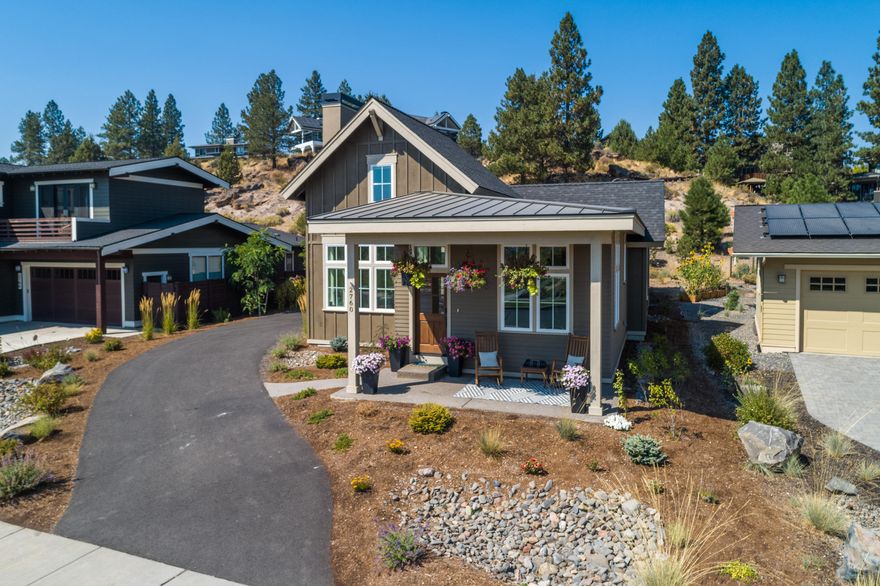 The original owners of this Curtis home had their home show-cased as part of the Tour of Homes event in 2018. This single level modern farmhouse in Bend's most
sought-after neighborhood lives large with generous vaulted ceilings and numerous windows that bring in an abundance of light. The high end finishes include stainless
steel appliances, subway tiles, a large kitchen island, granite slab countertops and reclaimed wood accents. Beautiful engineered hardwood floors run throughout the
house. The utility room offers plenty of space along with the oversized 2 car garage. There's even a separate office with French doors. Sip coffee on the covered front
porch and watch people in Discovery Park across the street. There's also a private courtyard with an automatic awning that is comfortable for entertaining in the evening.
The thoughtful design, along with its fabulous location and low maintenance yard make this home a wonderful choice for an easy lifestyle!