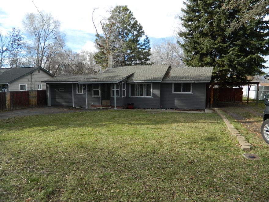 Great starter home or rental in the South Suburbs. This 2 bed 1 bath home sits on .27 acres There are 2 storage sheds, attached single car garage and carport. There is a brand new A/C unit although it does not have power to it. There is an RV dump