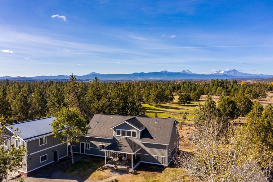 20 acres located just minutes from downtown Tumalo. Centrally located between Bend, Sisters and Redmond. Conveniently located near Cascade Village Shopping Center, with Trader Joes, Food 4 less, Lowes, Home Depot and more. Fully renovated modern farmhouse with open floor plan. There are 3 master suites, one on the lower level and two on the upper level with one additional half bath. Large windows throughout the home bring bright natural light all times of day. Brand new black stainless appliances and too many other gorgeous features to list. Watch the sunset over the Cascade Mountain range on the back deck from an Adirondack chair or oversized porch swing. Detached ADU accessible by outdoor stairs, above a 2 car garage. One bedroom and one bathroom. Take in the sunrise or sunset from its own deck! There is an additional detached garage/shop space with a one car garage. 20 acres fully fenced and cross fenced with hay cover/ lean to barn. 6 acres of irrigation. Horse Property!