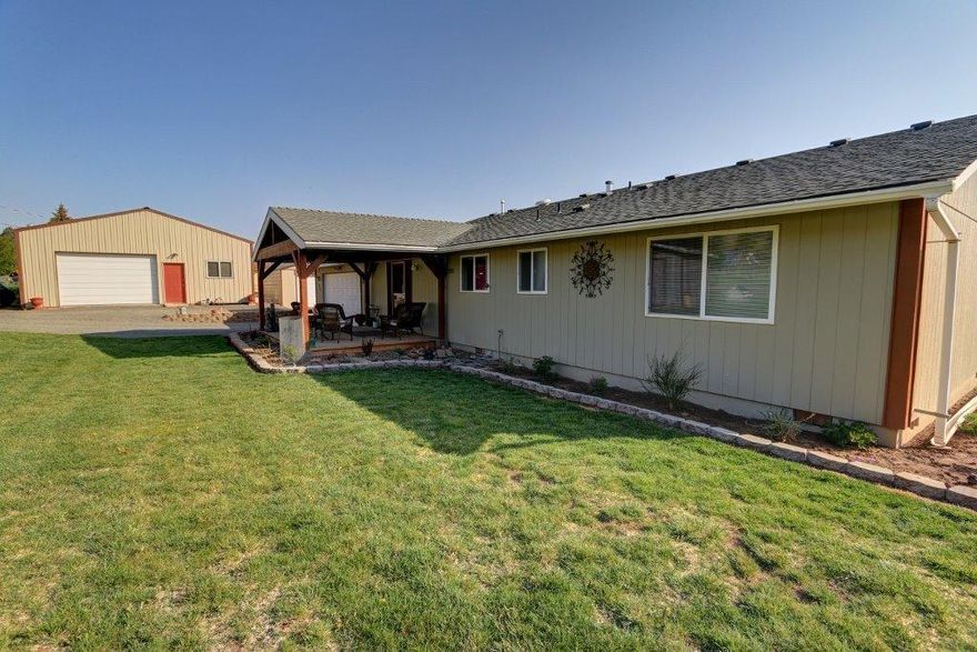 A Must See Home If You Need Space To Work And Play. Plenty Of Shop And Work Space. Over 1 Acre Of Fenced In Land. Insulated 24 X 30 Shop, Insulated 20 X 20 Shop, 1 10 X 10 Storage Shed And, 1 12 X 12 Storage Shed. 16 X 16 Green House With Tall High Quality Anti Deer Fenced Area, Utility Sink And Running Water To Green House. Fruit Trees. Sump Pump To Drain Run Off Driveway Water,2012 New Water Heater And New Holding Tank. 2013 New Forced Air Gas Cieling Unit Installed. New Front Deck Cover. 2014 New Pantry In Garage.