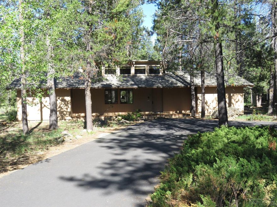 Cute & Cozy single level cabin ideally located in Meadow Village on a wonderful corner lot. Vaulted wood ceilings & wood walls, updated bathrooms with tile floors, counter tops & tile roll in handicapped shower in master suite. New exterior paint & decks. Enjoy relaxing in the private hot tub. Cozy electric fireplace in the vaulted living room with clear story window. Fully furnished & ready to enjoy! Low maintenance landscaping & paved circular drive.