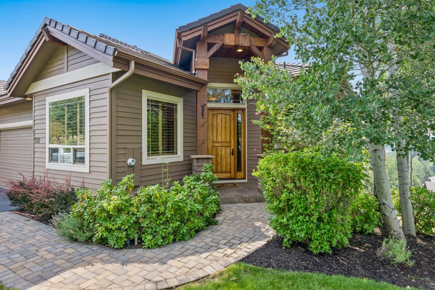 Gorgeous luxury townhome with outstanding Cascade Mountain views! Custom interior design with exceptional woodwork, dramatic vaulted ceilings, and new interior paint. The kitchen boasts Park Place cabinets, double ovens, farmhouse sink, and a large center island - perfect for entertaining! The spacious master suite is on the main level and features a walk-in closet, private access to the back deck, plus dual sinks, tile shower, and soaking tub in the master bath. Downstairs includes a junior master suite with a tile shower and soaking tub, plus a guest room, pantry/storage room, and gym. Bonus storage room off of the gym can be converted to a wine cellar. The office has beautiful new built-in cabinets with a murphy bed. Enjoy the mountain views and peaceful Bend days from the upper or lower decks. This home is one of a kind! Excellent location close to the Grove and easy access to schools, shopping, dining, entertainment, and the Deschutes River!