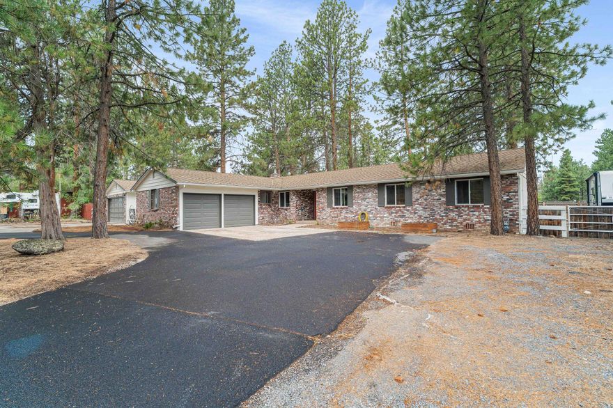 THE SELLER IS OFFERING A $5,000 CREDIT! Live the Bend lifestyle with space to stretch out! This well-appointed ranch-style home sits on over half an acre, offering the rare combination of privacy and proximity. Just minutes from Bend's best shopping, dining, medical services, and outdoor recreation, the location can't be beat. A brand-new neighborhood gem—Little Fawn Park—is also within easy walking distance, perfect for morning strolls, playtime, or picnics. Inside, enjoy 3 bedrooms, 2.5 bathrooms, a spacious living room, and a separate family room—perfect for relaxing or entertaining. The 18' x 24' shop adds incredible versatility for hobbies, storage, or creative projects. It's fully equipped with a 100-amp service, a 50-amp 240V receptacle, plumbing for air, and a dust collection system—ready for serious work or play. Outside, unwind on the back patio featuring a complete outdoor kitchen and a natural gas fire pit—ideal for entertaining year-round.
