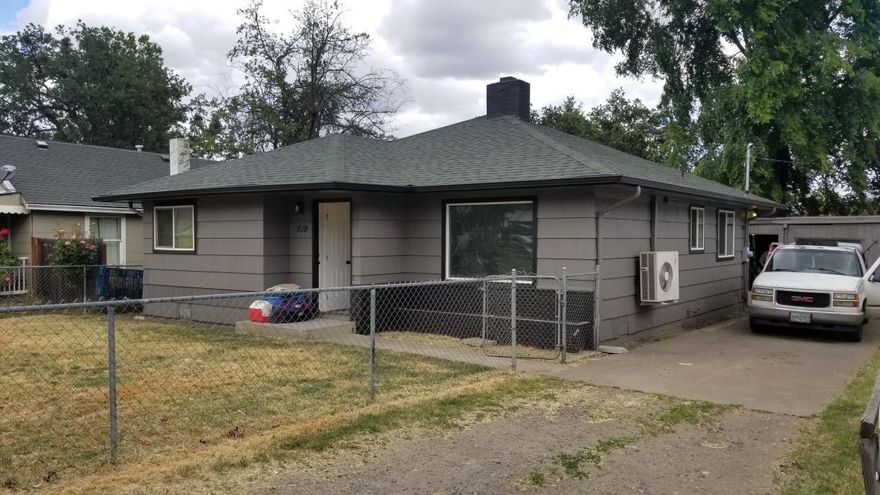 Remodeled home at an affordable price! Home turn key ready for you to move in. This 3 bedroom 1 bath home has been tastefully updated in and out. This won't last long! Seperate garage/shop. Alley access as well. Hardwood floors under carpeting. Fireplace, mini split heating/cooling system.