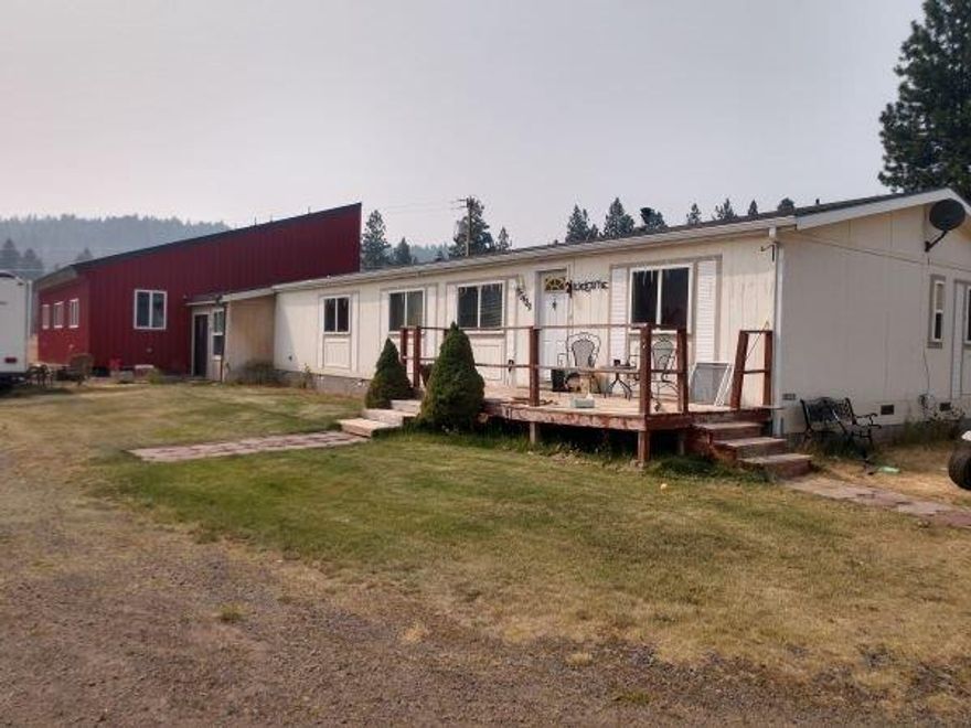 This 3 bedroom, 2 bathroom, is located on 4.92 acres, quiet location surrounded by beautiful pine trees. Two shops that could be used for a workplace and/or storage, full bathroom in one of the shops with two bay doors, loft/storage area.