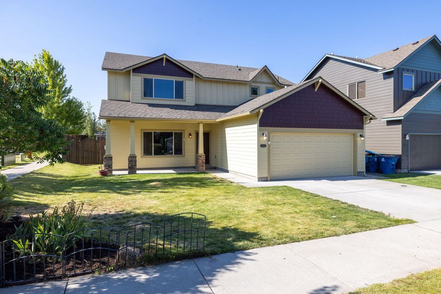 Welcome Home! This corner lot is a generously sized 4 bedroom with plenty of room to spread out. Brand new exterior paint and carpet! The primary suite on the main floor provides for single level living and privacy. Upstairs you will find three additional bedrooms, including a Jack-and-Jill layout, plus a massive bonus room equipped with surround sound! The main level features an open floor plan that seamlessly connects the living room, dining, and kitchen areas. Cozy gas fireplace adds warmth and ambiance to the spacious living room. Kitchen is equipped with stainless steel applicances, ample cabinetry, and a functional layout. From here, enjoy access to the flat fenced backyard that includes a patio, peaceful water feature, play structure, and a large TOUGH shed. Heat cables installed on roof. Conveniently located in NE bend close to St. Charles minutes to Mt View Park, and many restaurants. Enjoy Cascade mountain views from the street, and NO HOA! Check it out and priced to sell!