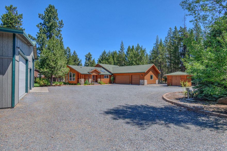 Outdoor-loving families, this one's for you. Stunning home with 3 spacious bedrooms, 2 bathrooms, and 2,050 sq ft of luxurious open-concept living. Move-in ready with high-end finishes throughout. Fully fenced, gated, irrigated, and beautifully landscaped & ideal for kids, pets, and outdoor living. RV hookups, a massive heated shop with it's own bathroom/mancave, and an attached 2-car garage offer space for all your toys and hobbies. Whether you're hosting backyard BBQ's or gearing up for weekend adventures, this property has it all. Located just minutes from town in a peaceful setting that feels like your own private retreat. Rare find! Don't miss it!