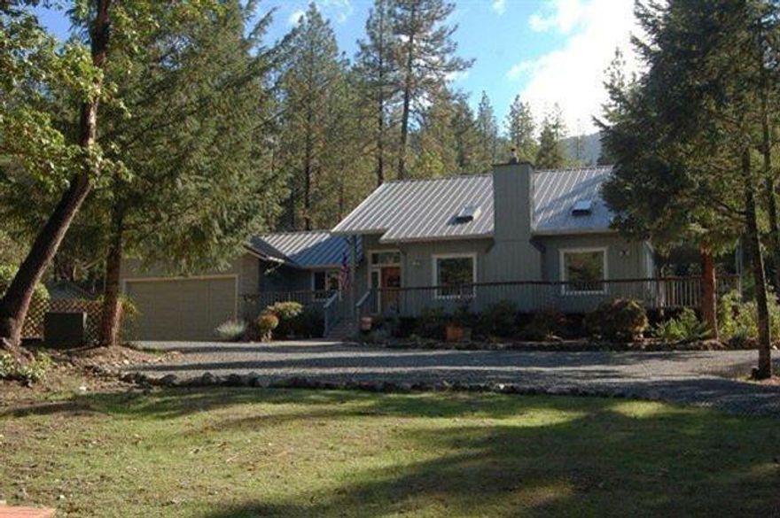 Priced at recent Appraisal. Located in the beautiful Williams Valley the home is situated to take advantage of the view. This wonderful home may have been built in 1994 but was upgraded by previous owners & upgraded even more by the current owners with a new roof, heat/air system, kitchen w/quartz counter tops & glass backing, new bath, upgraded lighting, water heater, additional insulation, gated fencing, just to name a few. Mud/laundry room is extra large w/great storage. Decking is all trex or brand like it. The home features vaulted ceilings, great windows for capturing the view, 2 big bedrooms - 1 up and 1 down with a loft/office area that could be the 3rd bedroom. There is a 2-car attached over-size garage w/more storage & workbench, a 1-car detached garage, plus covered RV parking. Located on 2.44 partly secluded acres among tall trees.
