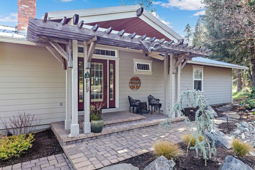 First Time on the Market - This move-in ready custom home offers a street level living room w/ floor to ceiling windows and custom wood leveler shutters. Kitchen, and dining room, sunroom or use for additional dining.  Large bedroom with walk-in closet and French doors out to the deck, guest bedroom, full bathroom. Vaulted ceilings, hickory hardwood floors, granite counters, Central Vacuum,  detailed wood trim, bead board wainscot. Built-in cabinets. Large upper deck with panoramic views from the Table Rocks to Mc. McLaughlin and the City lights at night. 2 wood burning fireplaces, underground utilities, metal roof with gutter guards and concrete siding for extra fire protection. Terraced, private lawn with room for a pool.  Lower level provides an extra living space, full bathroom, laundry room, with room for a possible ADU or 3rd bedroom with a private entrance from the exterior of the home.  Oversized 2-car garage with a separate office. Call today for a private tour.