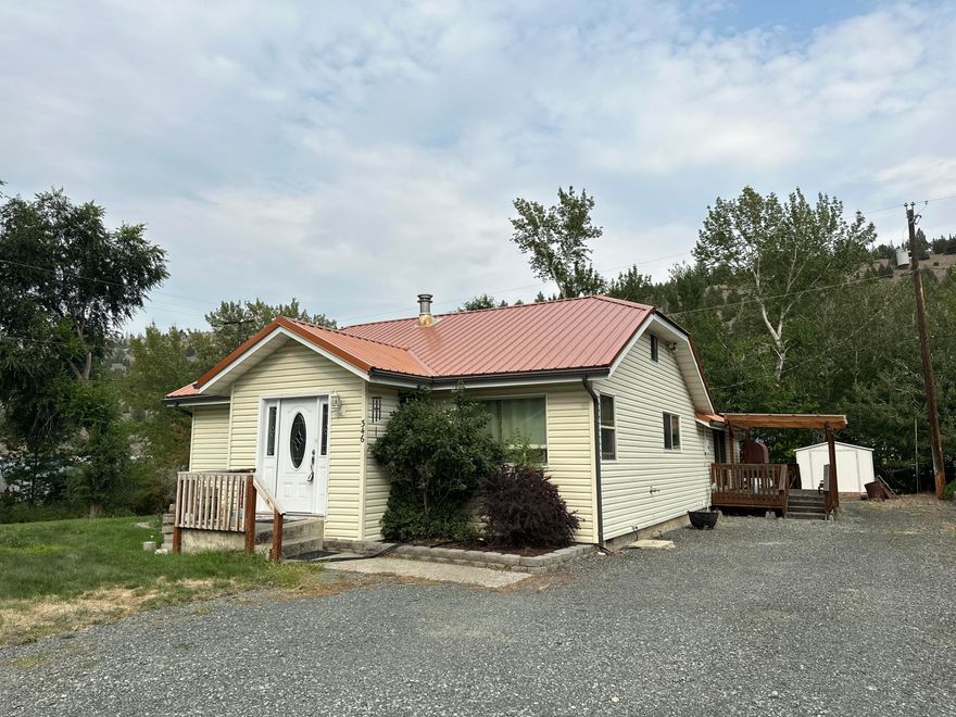 Pride of Ownership! Bordering Canyon Creek, this charming 3-bedroom, 2-bath home boasts 1,580 square feet of living space. Built in 1981, the property features a 0.21-acre lot with a beautiful yard, a covered deck, and a storage shed. It includes both a living room and a family room, along with a spacious kitchen filled with ample cabinets. The home is equipped with three heating sources: an electric furnace, a propane heater, and a laser oil stove. This well-maintained residence is move-in ready, both inside and out. New kitchen appliances included along with washer and dryer. New Microwave & Range ordered and will be installed
