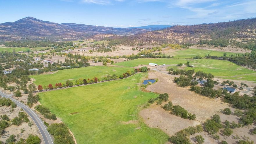 Long tree lined drive welcomes you to this exceptional, multi generational, irrigated, working ranch, with 3 homes on over 197 acres! Each home is on its own tax lot and individually saleable! 2021 built 2000sf, 4 bed, 2 bath with attached 2 car garage. 2018 double wide 2280sf, 3 bed, 2 bath. And the updated original 1940 farmhouse of 1370sf, 3 bed, 1 bath. There's a 5000sf hay barn, dairy barn, large insulated 2400sf shop with 4 garage doors including one for RV parking. Gated, fenced and cross fenced with roads that extend to the foothills and wrap around the perimeter of 85 irrigated acres. First cutting hay crop produced 4520 bales - 226 Tons valued at $81,360 and the second cutting, 2022, is expected to produce 3000 bales valued at $54,000.  All of this is 10 minutes to shopping in Eagle Point, Oregon. Property backs to over 4400 contiguous acres of public lands!