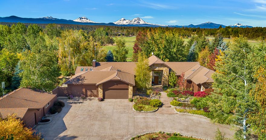 Exquisitely designed single level home on 9.89 irrigated acres in the highly desirable West Tumalo. Awe-inspiring front entrance with stamped concrete, meticulous landscaping and a bubbling brook like stream. Large windows and vaulted ceilings offer abundant natural light and bold cascade mountain views from most every room of this amazing home. Spacious chef's kitchen with upgraded appliances, granite countertops, travertine floors, and a large island. Expansive master suite that includes a 3 sided fireplace and private deck. The backyard setting is nothing short of breath taking, featuring decks, patios, a koi pond with waterfall, meandering pathways and a gazebo. Bring your lunch and a bottle of wine, you will not want to leave! Let's not forget the finished shop with separate office/flex space, 4 stall barn, hay/RV storage, tack room, paddock, arena and turn out pastures. Quiet and quaint setting just minutes to Bend, must see to appreciate all this property has to offer.