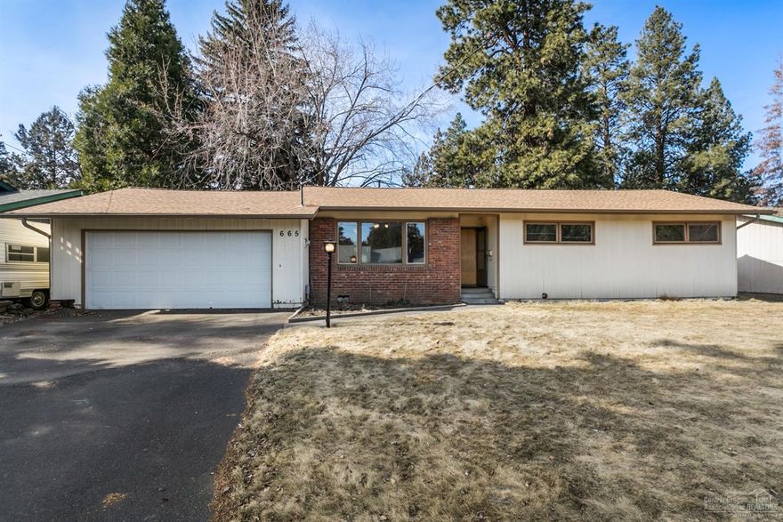 Single level home on .20 acres in Bend's popular Midtown area, offers a large and fenced backyard, close proximity to downtown, and Juniper Fitness Center. This lovely home has new carpeting in the bedrooms, new interior paint throughout, an enclosed, backyard porch, large patio, updated kitchen with all appliances, spacious master, both a living and family room, dining area, and garage. This home has so much potential and would make for a great home in the heart of Bend.