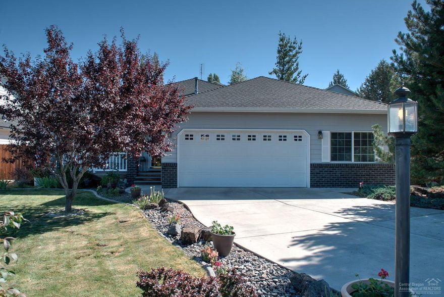 Fantastic Floorplan! Darling, Spacious Single Level Home in a sunny cul-de-sac with Views of the Sisters from living room and porch. Wonderful great room features vaulted ceilings, kit w/breakfast bar, wall of pantry cabinets & big fam rm w/fireplace. Large office thru the garage w/exterior access too. (could be shop!) Laundry loaded w/extra cabs, 8 x 10 storage room, extra insulation keeps home cozy! Quality window coverings, lovely landscaping with mature trees, storage shed and more!