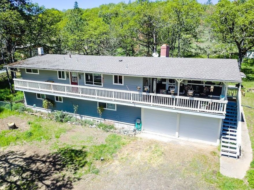 This Jacksonville home features 4 bedrooms/ 2 bathrooms and 3 bonus rooms with 2366 sq. ft of living space all on 3.27 acres. Gorgeous hardwood floors flow throughout the main floor as well as oak cabinets in the kitchen. Located off the main floor is a screen room where you can watch the wildlife walk by and the trees sway. Very relaxing and peaceful. There are two bonus rooms in this home with unlimited potential as well as two fireplaces. This Jacksonville home isn't too far out and features mature trees, fenced garden and outbuildings. We have newer a newer roof, double paned windows, updated furnace.