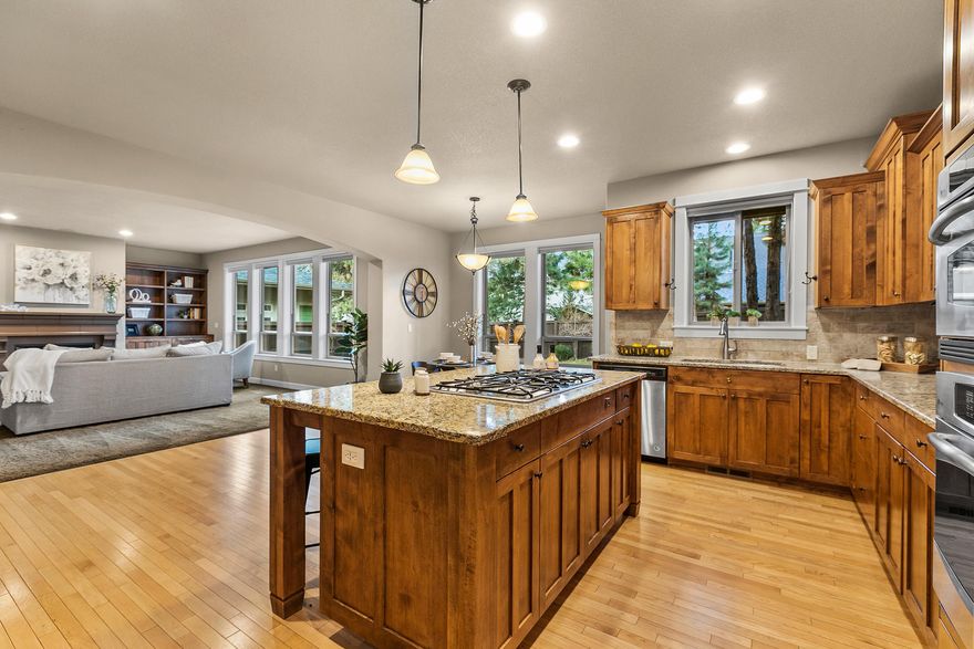 True NW Bend experience, located steps from world class mountain biking + hiking trails providing access to Shevlin Park ~ 981 acres of forested park w/ Tumalo Creek. Close to cafes, pubs, restaurants, shopping in NorthWest Crossing and Downtown. Main level has tall ceilings & open concept in living/kitchen with separate formal dining and office space. H/W flooring downstairs, kitchen w/ solid surface granite countertops, large island and custom cabinets from Brian's Cabinets. Great room with gas fireplace, mantle and custom built-ins. Upstairs provides 4 spacious bedrooms + bonus room + reading loft w/desk, ideal for distance learning needs. Master suite with ample walk-in closet space, dual vanity, tile shower and soaking tub. Additional features: fenced rear yard w/large deck, Central Vac, High End Window Coverings, whole house fan & Paver side yard. Quality built to high Earth Advantage certification = healthier indoor air quality + highly energy efficient.