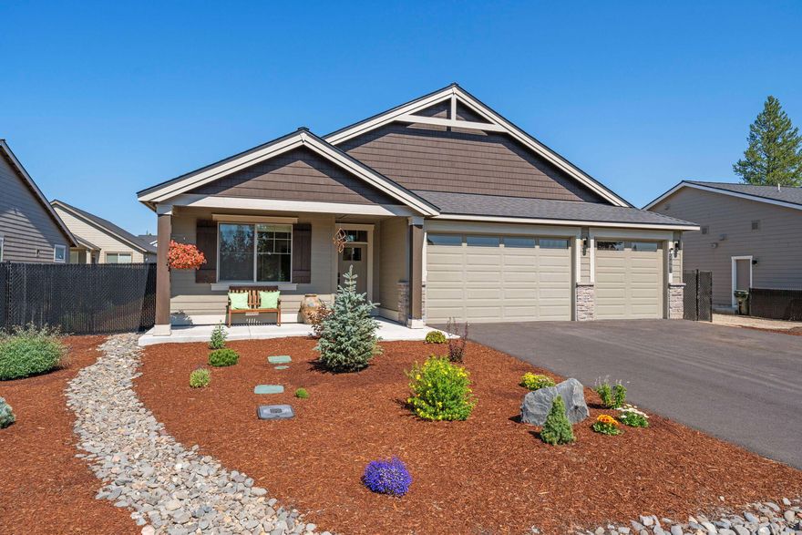 Highly upgraded and better than new, this single-level Craftsman in Crescent Creek offers 4 bedrooms, 2 baths, and a 3-car garage across 2,070 sq ft. The vaulted great room features built-in cabinetry and flows into an open kitchen with quartz counters and an island with seating for four. Thoughtful upgrades include central A/C, a tankless water heater, and an enhanced laundry room with cabinets and sink. The spacious primary suite offers a soaking tub, separate shower, and walk-in closet. An owner's entry off the garage with built-in bench adds convenience. Outside, enjoy a peaceful, fenced backyard with drip irrigation and low-maintenance landscaping surrounded by pines, meadows, and frequent elk visitors. Community perks include paved trails, clubhouse, fitness center, and sport court. Close to the Deschutes River, La Pine State Park, Sunriver, Bend, and Mt. Bachelor.