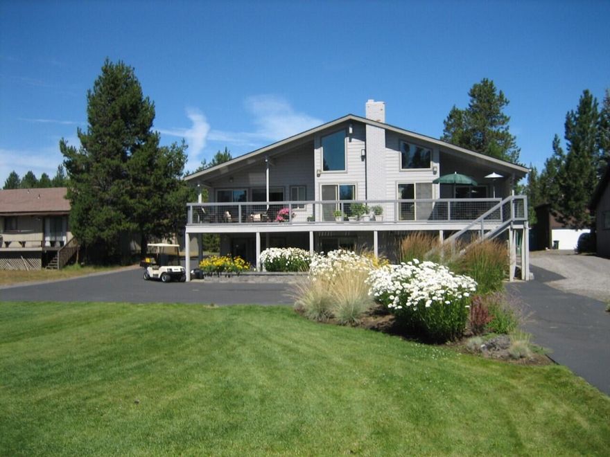This is a one of a kind Big Deschutes River from home with a private boat slip with a level landscaped yard to the river. Large deck over looking the Big Deschutes River with a fire pit. This 2 story home has been updated throughout with 4 bedrooms 3 bathrooms with view of the river from almost every room in the house. Vaulted Livingroom with knotty pine ceiling, fireplace and a wall of windows looking out to the river. Family room also has a fireplace, wet bar and views of the Big Deschutes River. Paved driveway down to your private dock walkway. Over 3500 sq.ft of living space with a large upper deck and a lower paver patio sitting area with a hot tub. Landscaped front and back yard. This is a must see property.
